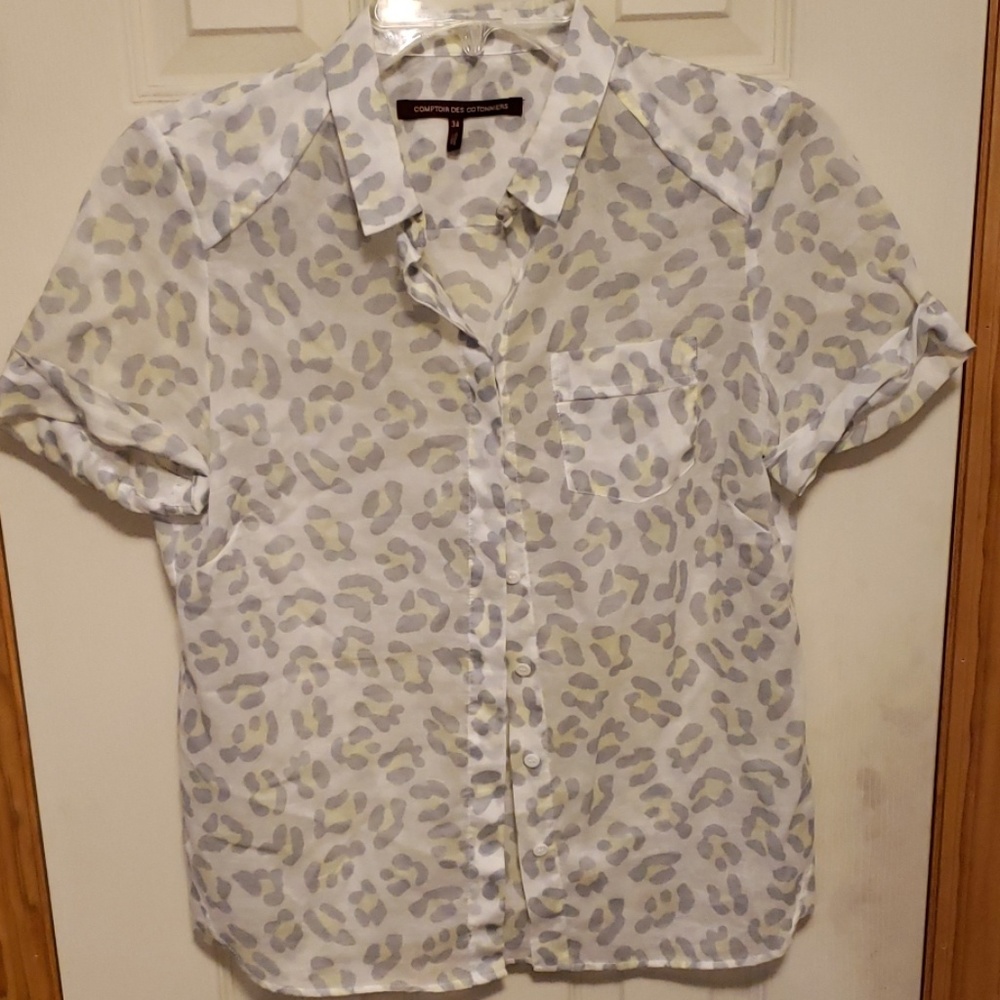White, grey, and yellow button down collared shirt